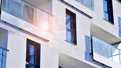 Obraz premium Residential area with modern apartment building. Multi Storey modern, new and stylish living block of flats.