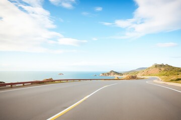 curved coastal road with sea and sky horizon