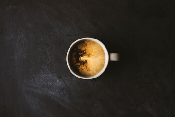 Coffee with milk on the table