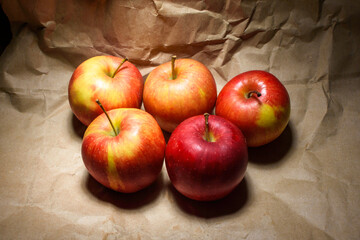 red apples on wooden table