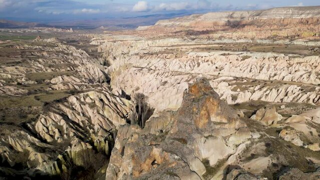 Aerial drone view of the natural beauty of the Rose Red Valley in Cappadocia, Turkey. Famous destination for hikers to explore the Rock Sites of Cappadocia