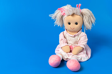 Isolated old doll toy for a child
