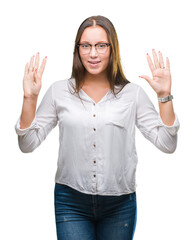 Young caucasian beautiful business woman wearing glasses over isolated background showing and...