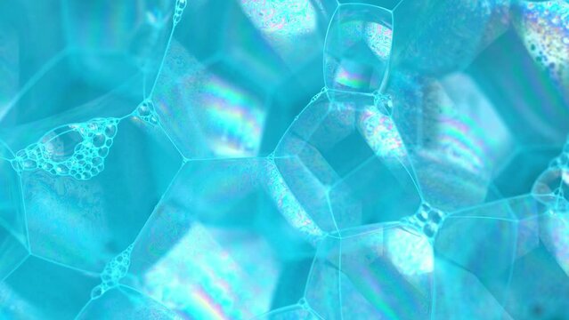 Magic wallpaper, soap sud macro structure. Blue foam soap with bubbles, rotates abstract background. Colorful soap foam with popping bubbles background. Abstract macro molecule pattern.