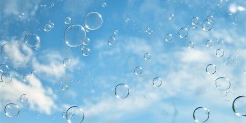 Soap bubbles on the blue sky background. Eco friendly cleaning service background. 