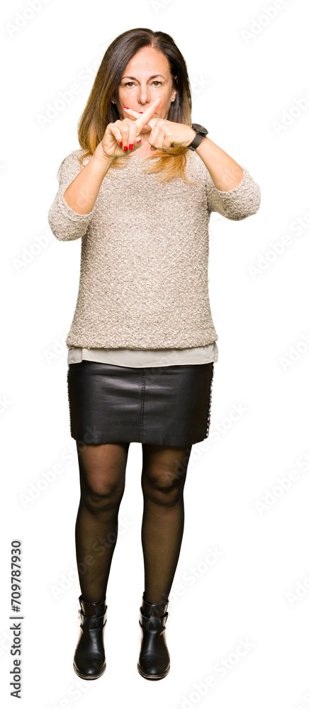 Sticker Beautiful middle age woman wearing fashion sweater Rejection expression crossing fingers doing negative sign