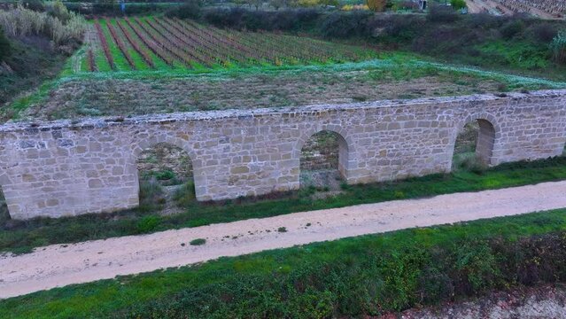 San Andr&eacute;s de Muga aqueduct between vineyards in autumn in Labastida in the province of Alava. Aerial view from a drone. Basque Country, Spain, Europe