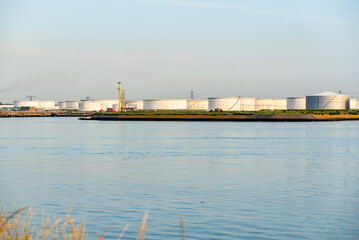 View of a oil terminal at sunset in summer