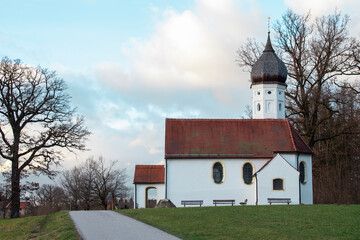 Fototapeta premium Lonely church on a winter morning in southern Germany