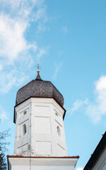 Church dome against the blue sky on a winter morning in southern Germany