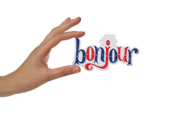 PNG word bonjour in hand isolated on white background. © Atlas