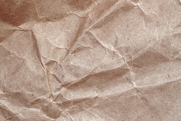 Texture of crumpled craft paper, background for design, copy space
