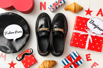 French beret, loafers and expressions, concept of learning French. © Atlas