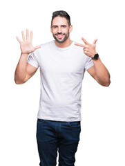 Young man wearing casual white t-shirt over isolated background showing and pointing up with fingers number eight while smiling confident and happy.