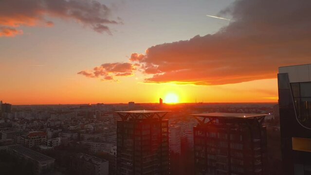 Aerial Establishing Shot Of Bucharest  City Skyline Residential Buildings With Golden Sunset View