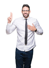 Young handsome business man wearing glasses over isolated background Swearing with hand on chest and fingers, making a loyalty promise oath