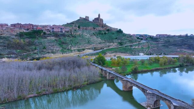 Church, castle and medieval bridge over the Ebro river in the walled area of San Vicente de la Sonsierra in La Rioja, Spain, Europe
