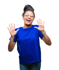 Young braided hair african american girl wearing glasses over isolated background showing and...