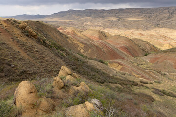 Landscape of Kakheti region in eastern Georgia with dry meadows and sandstone mountains