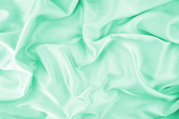 Turquoise chiffon fabric texture for background.