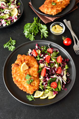 Chicken schnitzel and vegetable salad