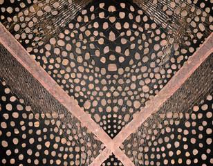 Radiant rose gold pattern and texture on a black background