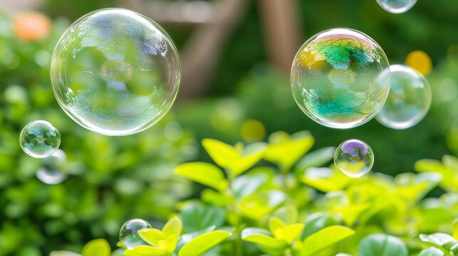 Iridescent soap bubbles floating gracefully above a lush green garden