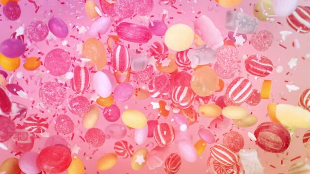 Super Slow Motion Shot of Sweet Colorful Candies Flying and Rotating in the Air at 1000fps.