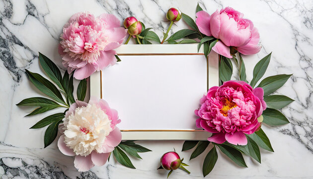 Blank greeting card in frame made of pink color peony flowers on white marble background. Wedding invitation. Mock up. Flat lay. Womens day layout