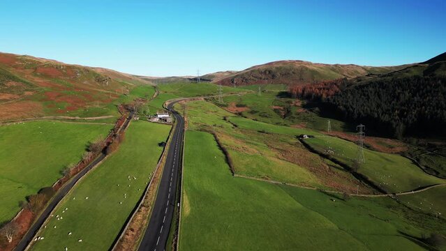 Aerial footage over A6 road near Kendal in the Lake District, UK