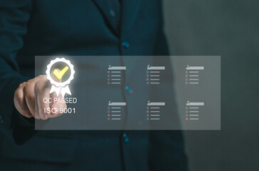 Businessman touches virtual screen on ISO9001 icon. Concept of doing qc pass and analyzing and collecting big data for business organizations. Making questionnaire Checking feedback. Quality control.