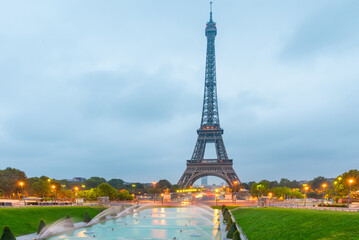 Eiffel tower at sunrise viewed from Jardins du Trocadero in Paris, France. Famous landmark and popular travel destination