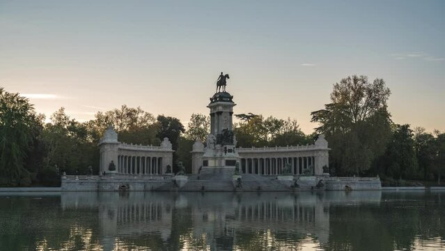 Madrid Spain time lapse, city skyline sunrise timelapse at El Retiro Park