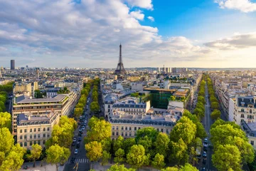 Papier Peint photo autocollant Paris Aerial view of Paris with Eiffel Tower and Champs Elysees from the roof of the Triumphal Arch. Panoramic sunset view of old town of Paris. Popular travel destination