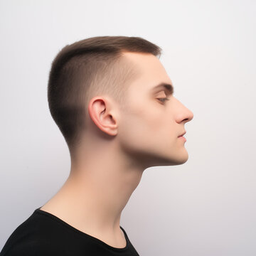 man in profile on white background, man with no beard, photo studio, beauty product for men