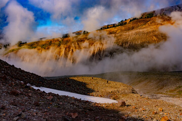 Sunrise in gorge, with mist