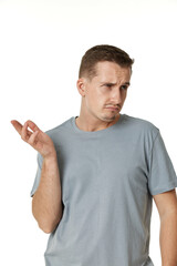 Fototapeta premium offended frustrated young man on white background. sadness