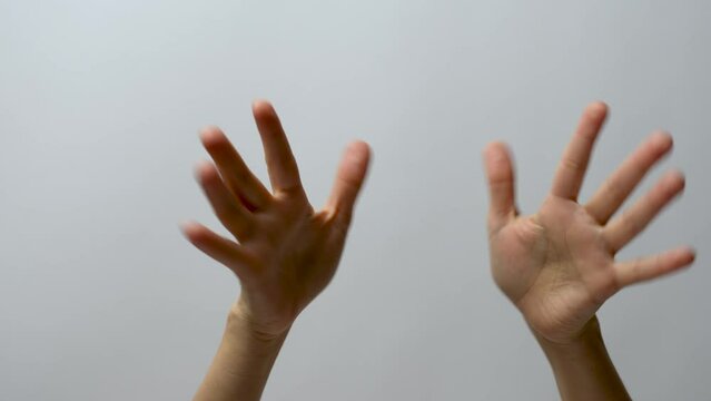 Hands waving gesture, white background. Greeting hands