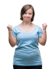 Young adult woman with down syndrome over isolated background very happy and excited doing winner...
