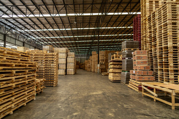 background of pallet wood in warehouse. pattern wood section. Grid of wood squares. the raw of...