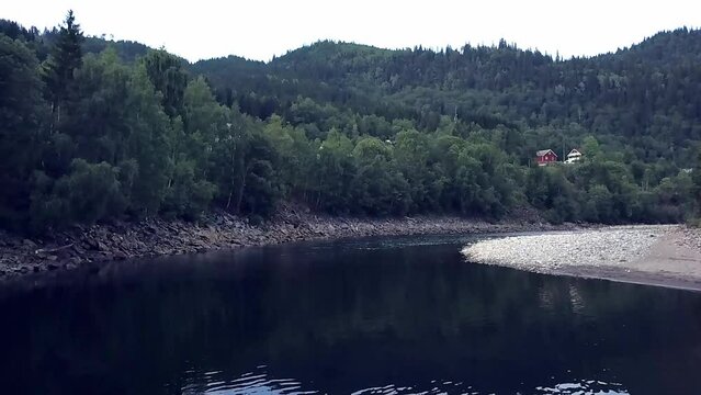 Drone footage of Gaula River and salmon fisherman fly fishing. Gaula River, Norway
