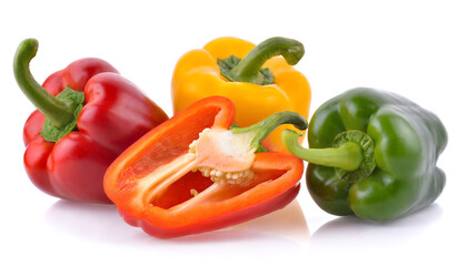 Red, green and yellow bell peppers isolated on white background