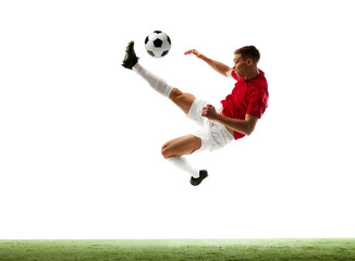 Precision meets flight. Dynamic portrait of a professional football player executing flawless...