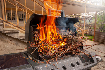 Empty Hot Barbecue Grill With Bright Flame