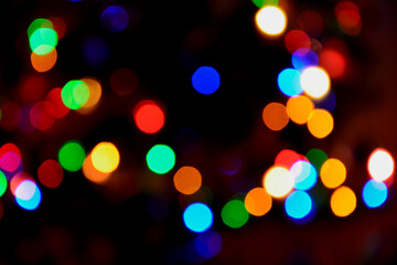 kolorowe światełka na czarnym tle, blurry lights, rainbow confettis on a black background,...