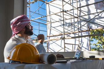 Arab businessman in construction site