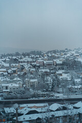 view of the city with snow