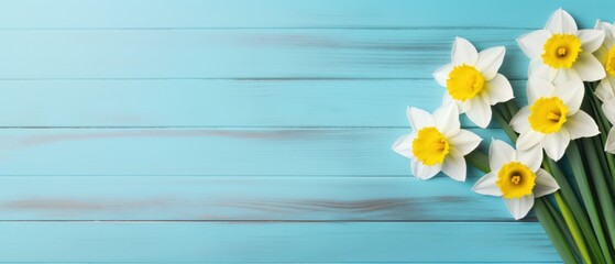 Bouquet of daffodils on a blue wooden background . Springtime Concept. Mothers Day Concept with a Copy Space. Valentine's Day with a Copy Space.	