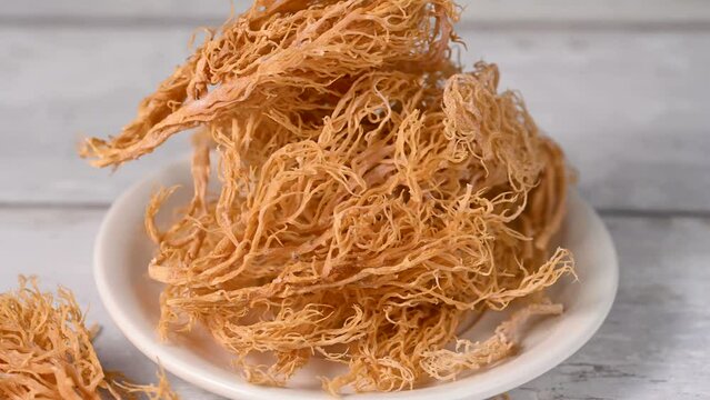 Sea Moss, closeup dried seaweed, used as food supplement.