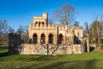 View of the Mosburg, an artificial ruin on the edge of the Mosburgweiher, fed by the Mosbach, in the Biebrich Castle Park in Wiesbaden